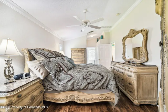 a view of a livingroom with workspace and a window