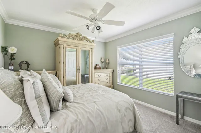 an aerial view of residential houses with outdoor space and street view