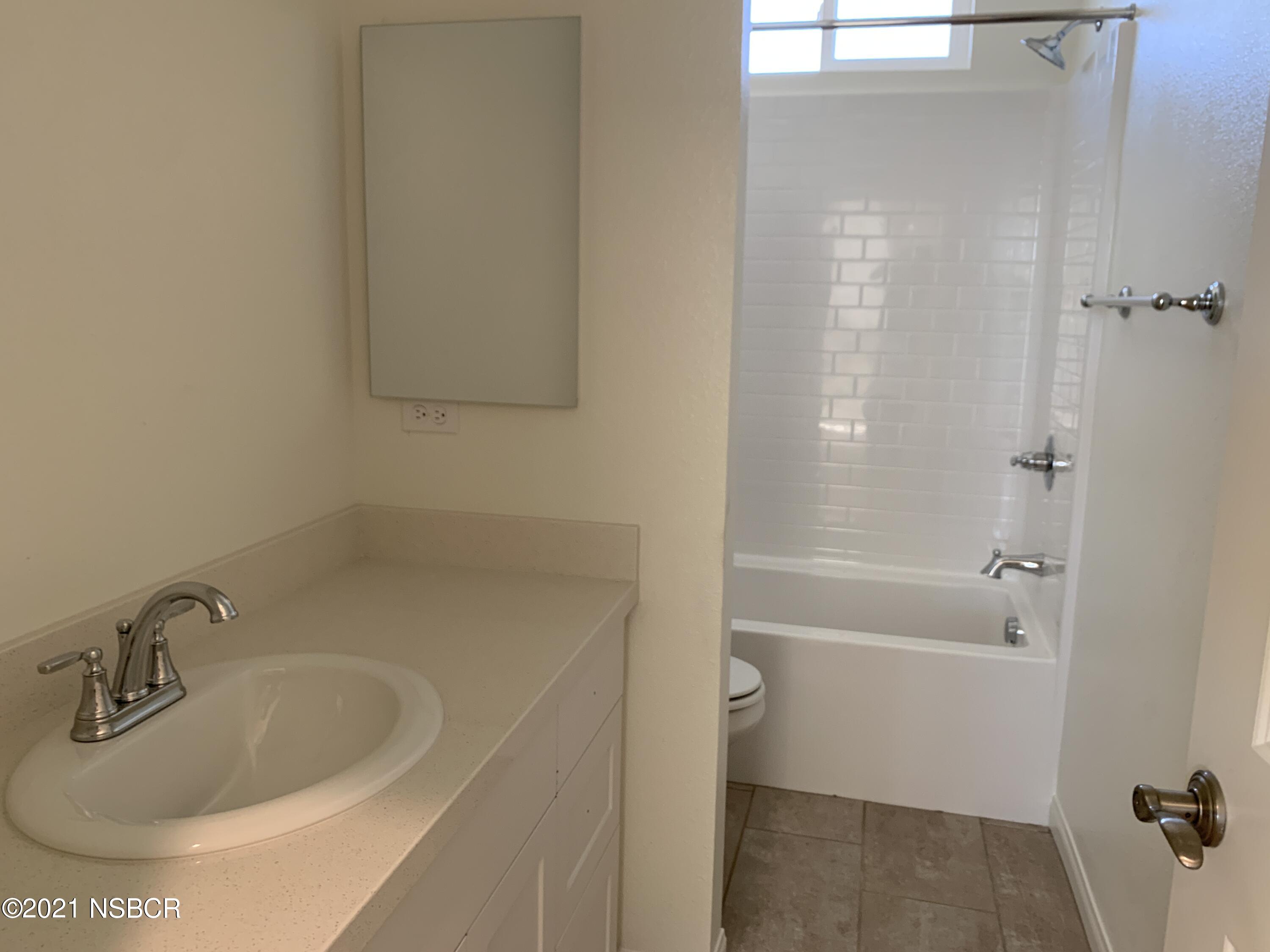 150 White Sage Lane Lompoc, CA 93436 - Photo 11 of 15 a bathroom with a sink and a bathtub