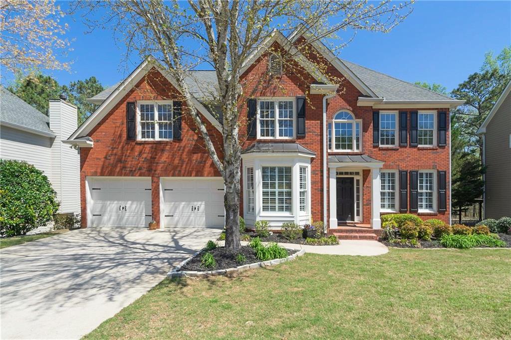 8068 Ridge Valley Woodstock, GA 30189 - Photo 1 of 1 8068 Ridge Valley-Great curb appeal.
