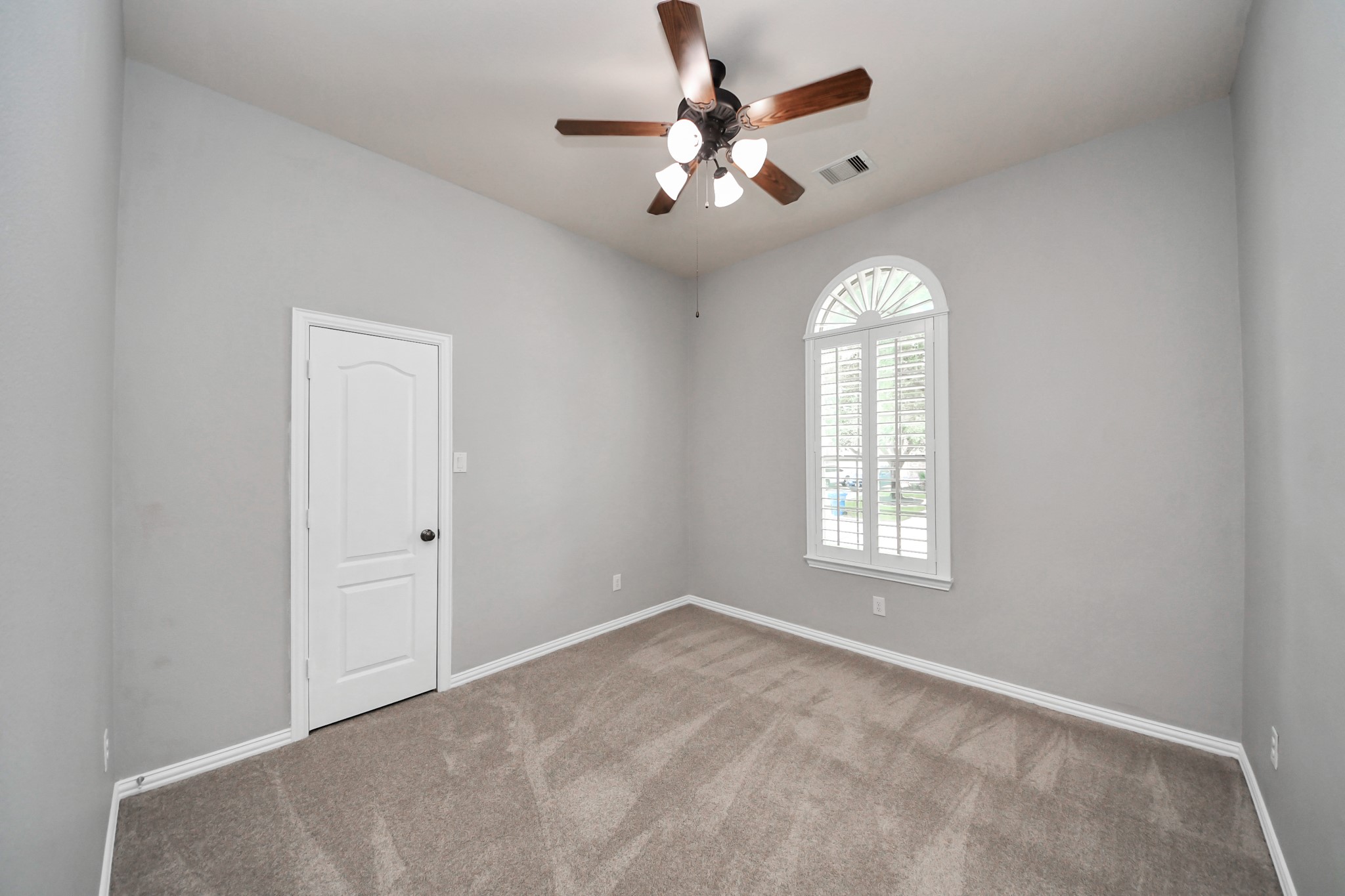 27515 Chris Ridge Court Spring, TX 77386 - Photo 37 of 48 Comfortable secondary bedroom with versatile space.