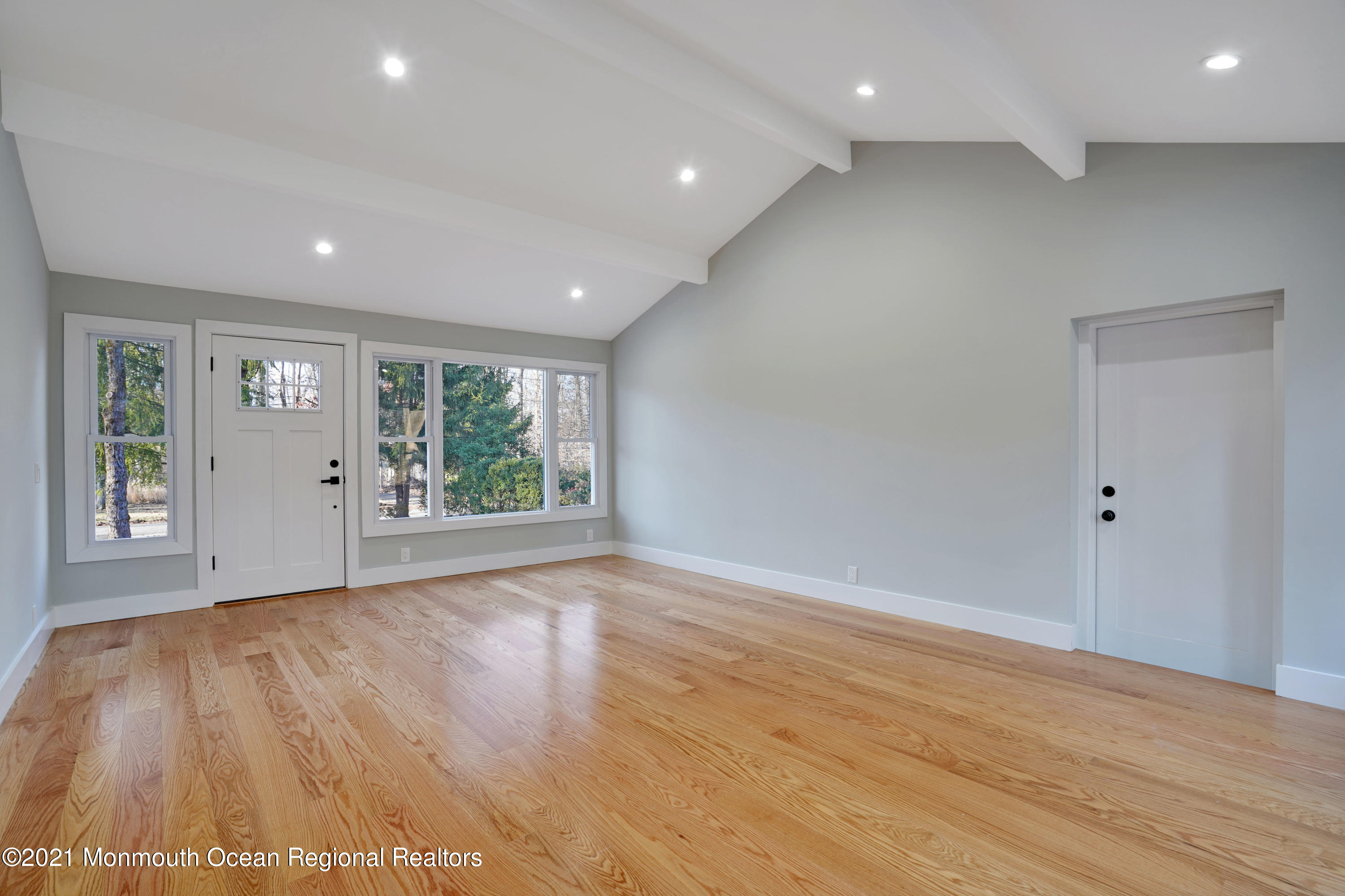 1155 Crim Road Bridgewater, NJ 08807 - Photo 14 of 29 an empty room with wooden floor and windows
