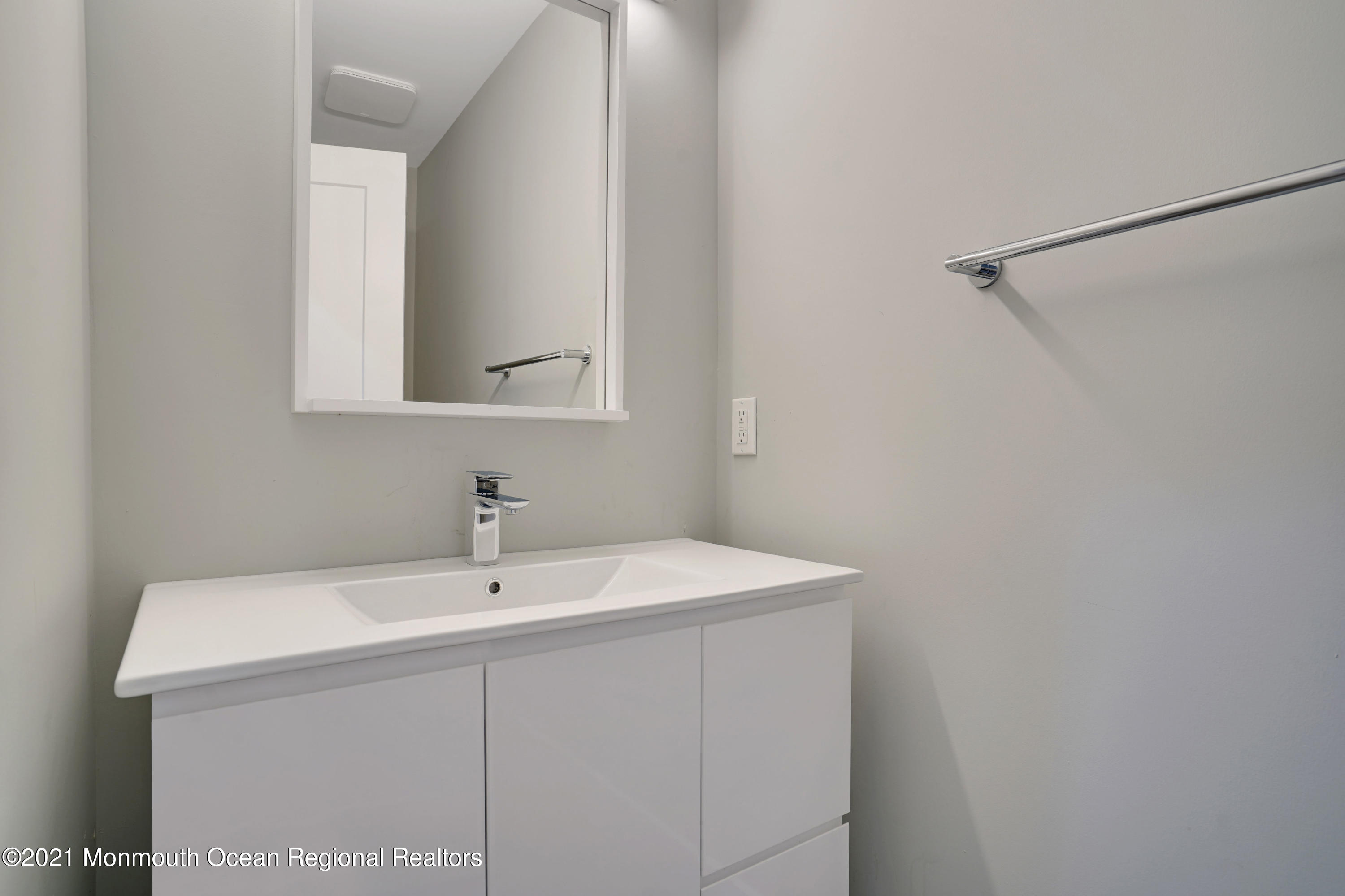 1155 Crim Road Bridgewater, NJ 08807 - Photo 16 of 29 a bathroom with a sink and a mirror
