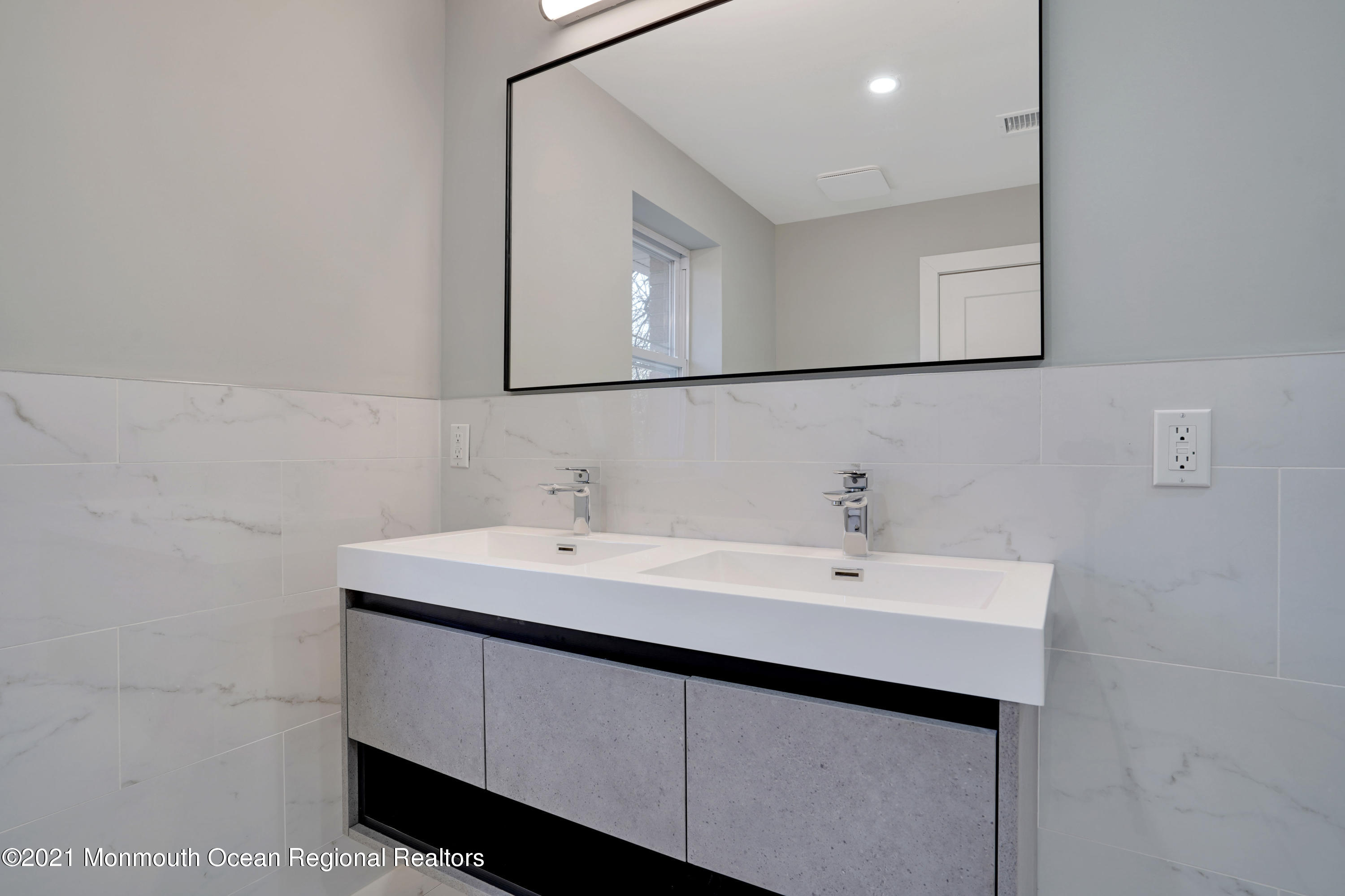 1155 Crim Road Bridgewater, NJ 08807 - Photo 19 of 29 a bathroom with a sink and a mirror