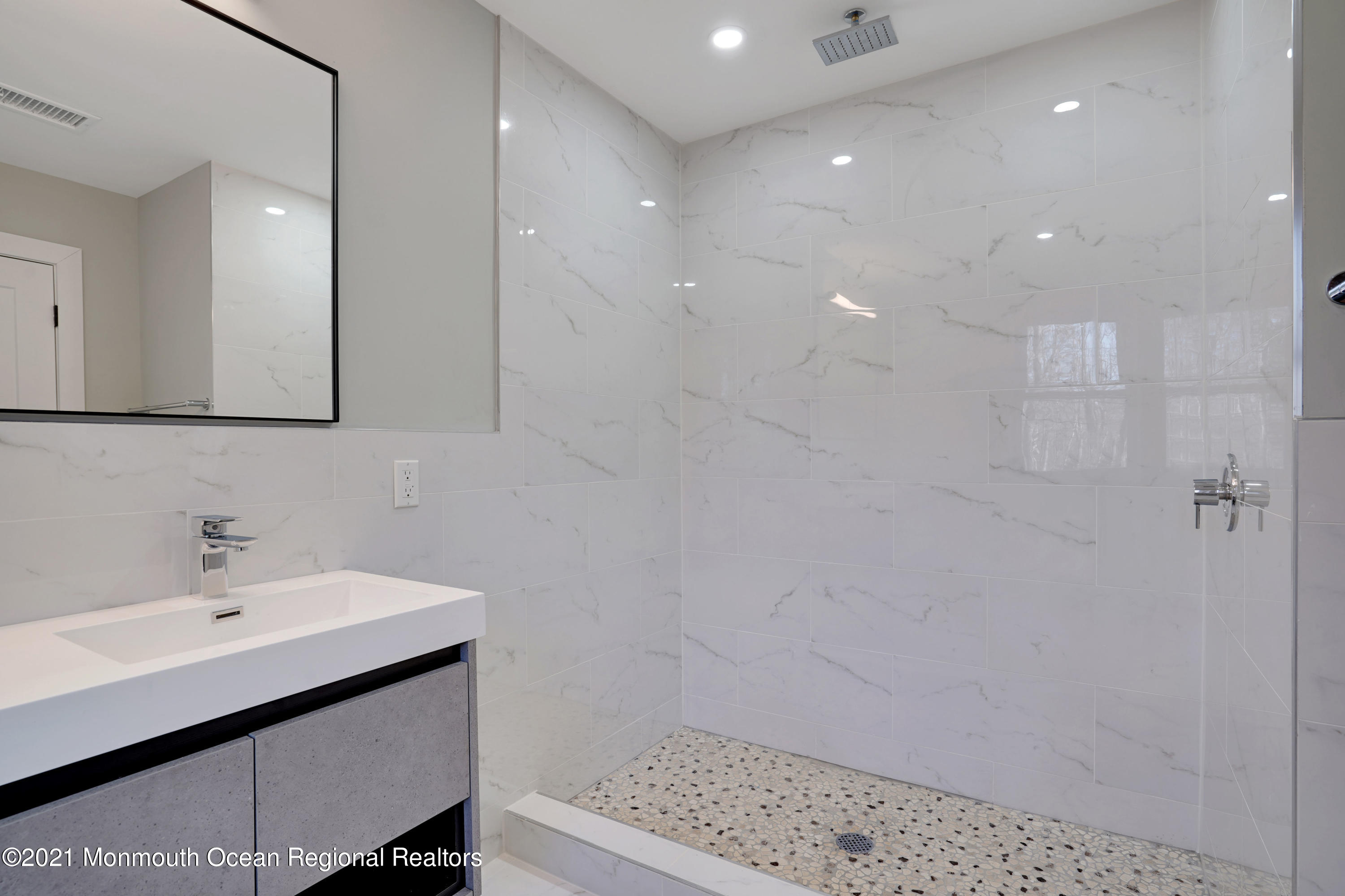 1155 Crim Road Bridgewater, NJ 08807 - Photo 20 of 29 a bathroom with a sink a toilet and shower