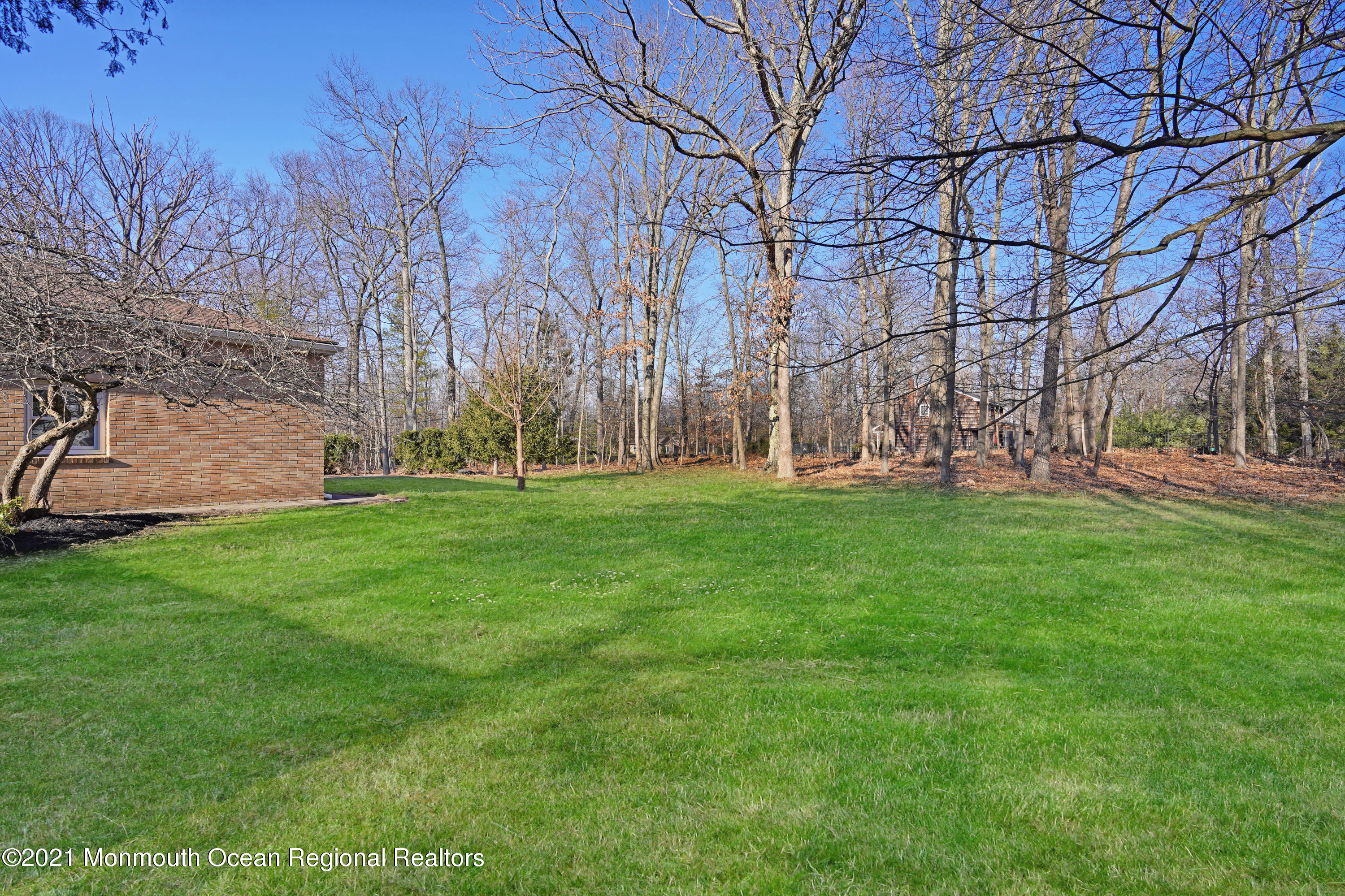 1155 Crim Road Bridgewater, NJ 08807 - Photo 28 of 29 a view of grassy field with benches