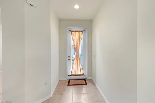 a view of an empty room with window