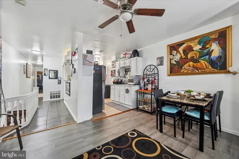 a bedroom with a bed and a chair