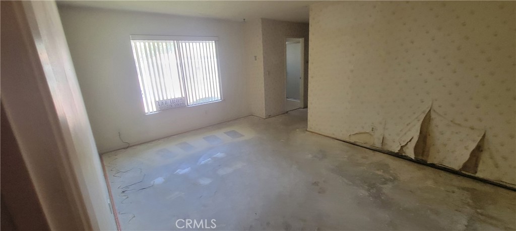 4 Dearborn Circle Redlands, CA 92374 - Photo 12 of 17 a view of an empty room with a window