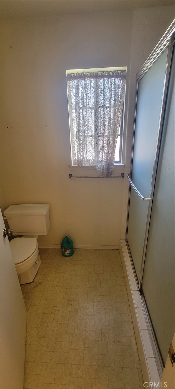4 Dearborn Circle Redlands, CA 92374 - Photo 15 of 17 a bathroom with a toilet