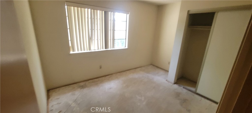 4 Dearborn Circle Redlands, CA 92374 - Photo 8 of 17 a view of an empty room with a window