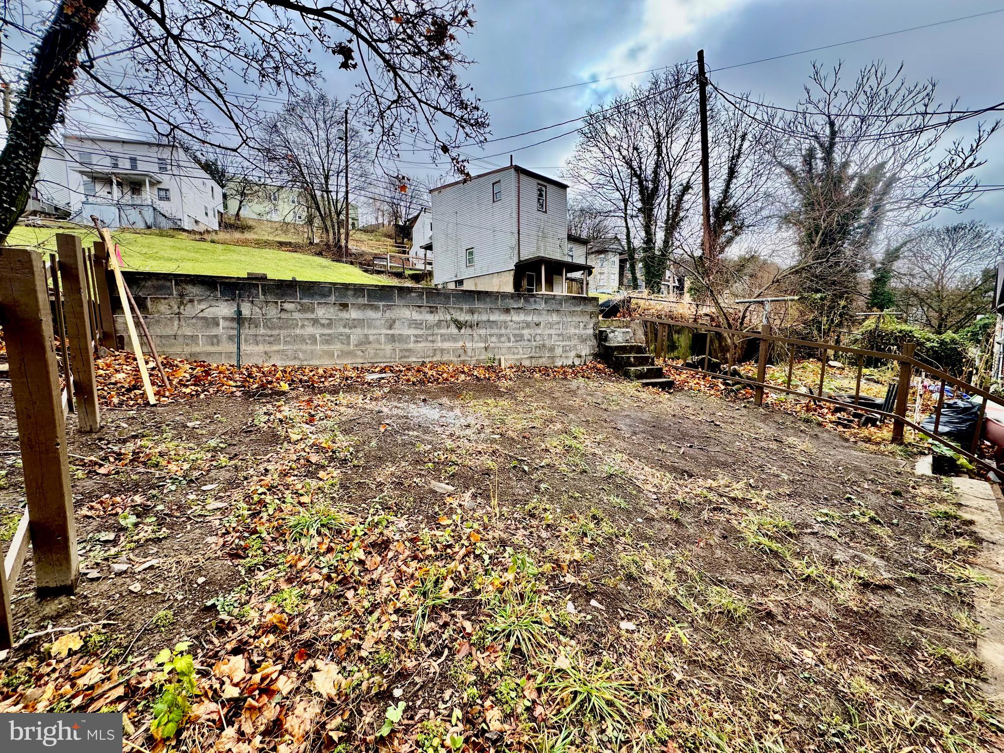 467 Goethe Street Cumberland, MD 21502 - Photo 19 of 19 a view of a yard with wooden fence