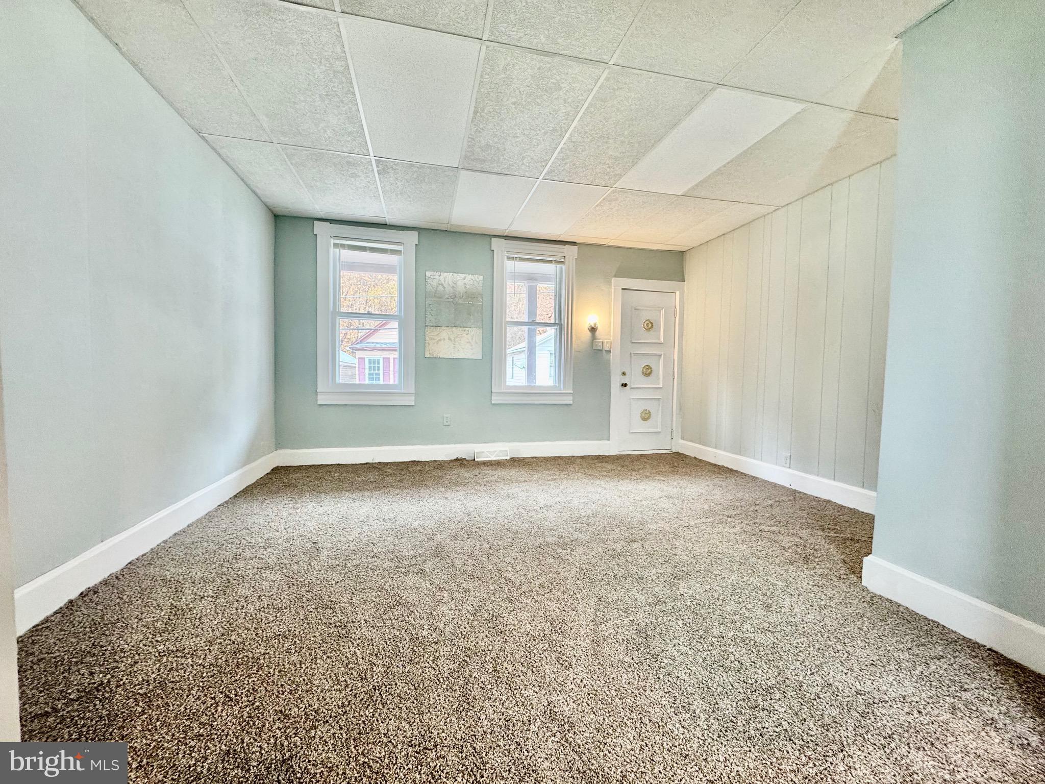 467 Goethe Street Cumberland, MD 21502 - Photo 3 of 19 an empty room with windows