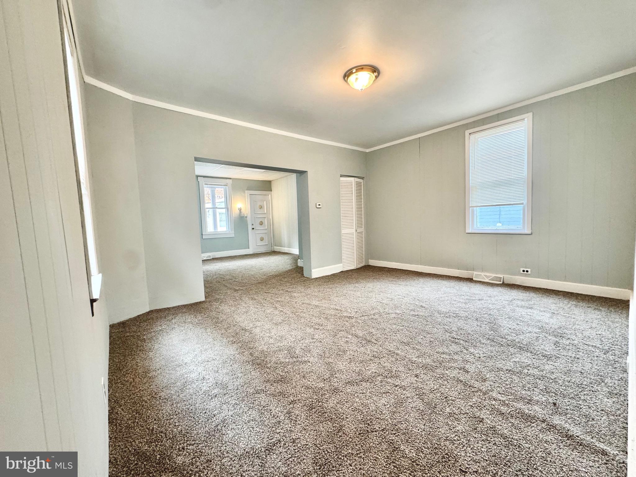 467 Goethe Street Cumberland, MD 21502 - Photo 4 of 19 an empty room with windows and closet