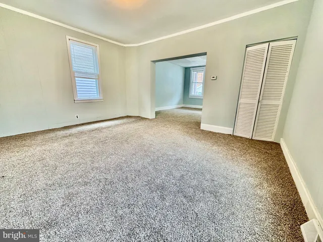 an empty room with windows