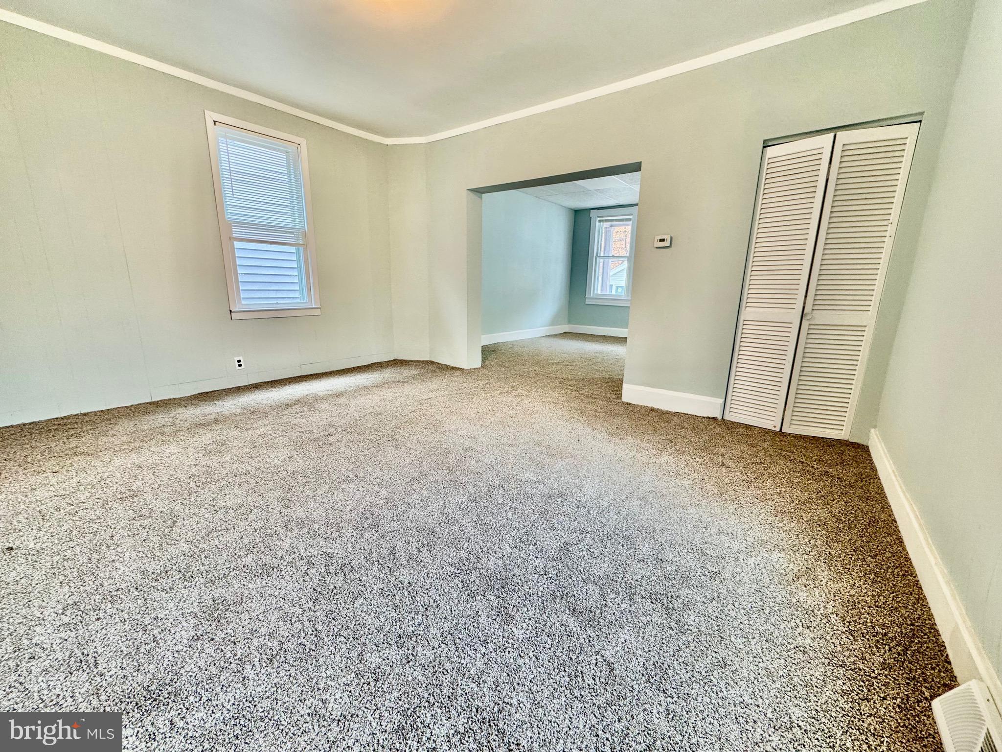 467 Goethe Street Cumberland, MD 21502 - Photo 5 of 19 an empty room with windows