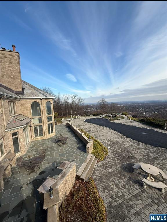 24 Club Way Cedar Grove, NJ 07009 - Photo 13 of 18 a view of a lake with a house in the background