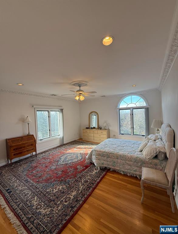 24 Club Way Cedar Grove, NJ 07009 - Photo 15 of 18 a bedroom with a bed and a couch