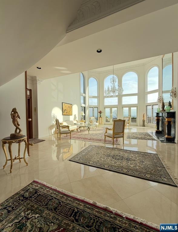 24 Club Way Cedar Grove, NJ 07009 - Photo 4 of 18 a living room with lots of furniture and a rug