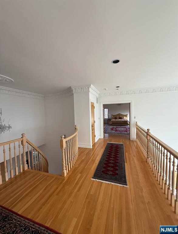 24 Club Way Cedar Grove, NJ 07009 - Photo 8 of 18 a view of a bedroom with furniture and staircase