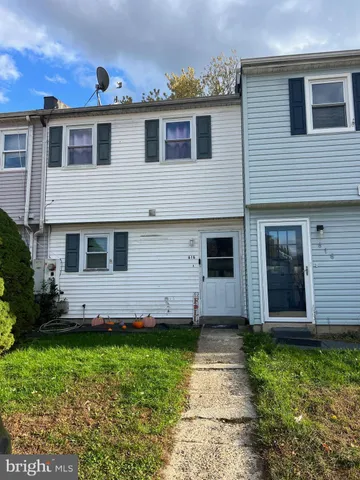 a view of a house with a garden