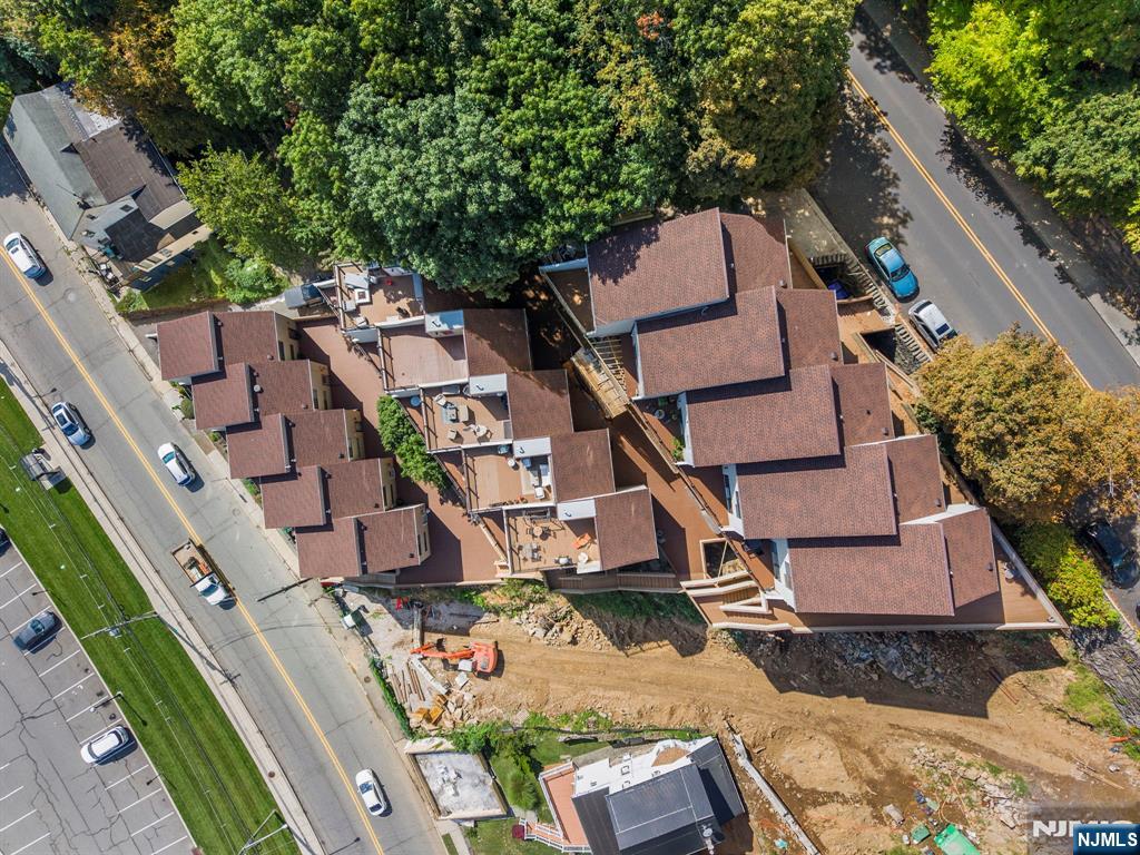 101 Highway 5, Unit 206 Edgewater, NJ 07020 - Photo 46 of 48 an aerial view of a house with a yard