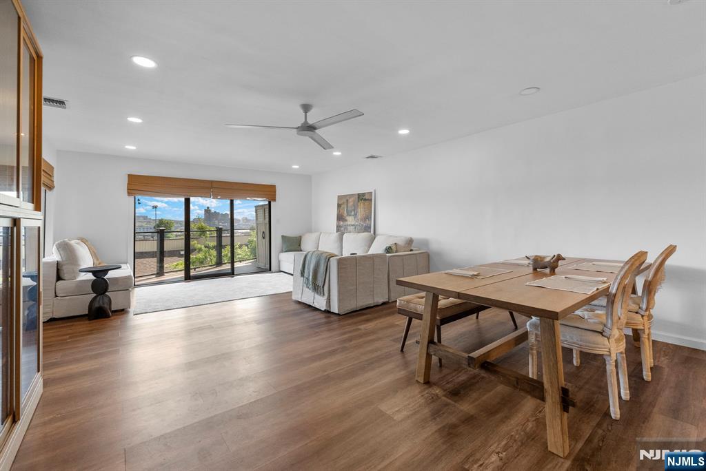 101 Highway 5, Unit 206 Edgewater, NJ 07020 - Photo 6 of 48 a view of a livingroom with furniture and a table