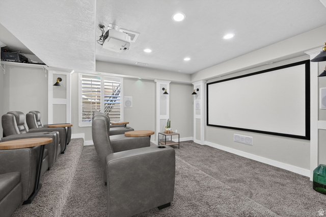 14714 South Bright Wood Road Herriman, UT 84096 - Photo 36 of 41 **Virtually Staged** Cinema room featuring carpet, recessed and theater lighting, screen and projector