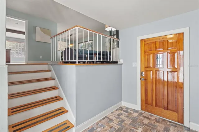 a view of entryway with stairs