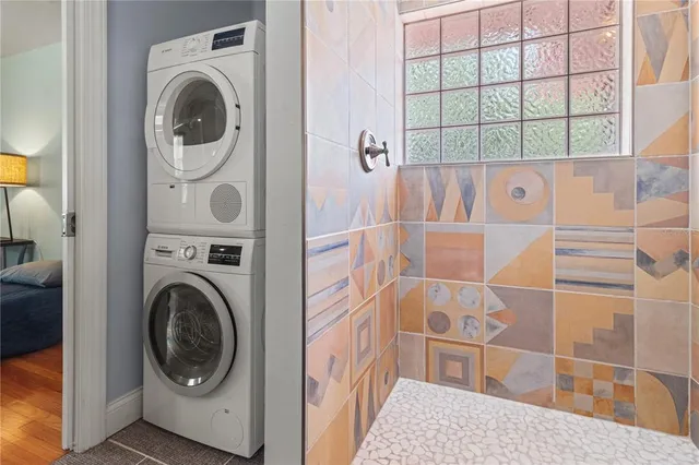 a bathroom with a bathtub and a toilet