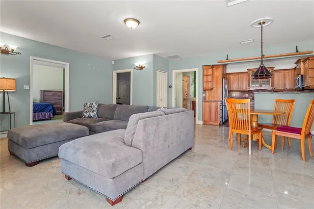 an aerial view of a house with outdoor space and street view
