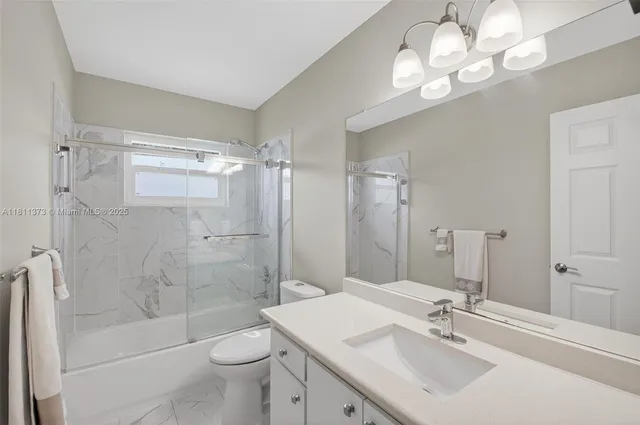 a view of a patio with a table chairs and a table