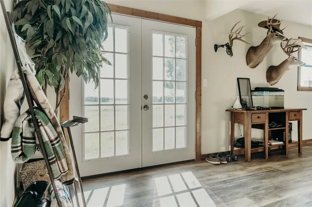 a view of entryway with wooden floor