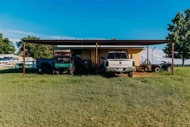 a view of a golf course with chairs