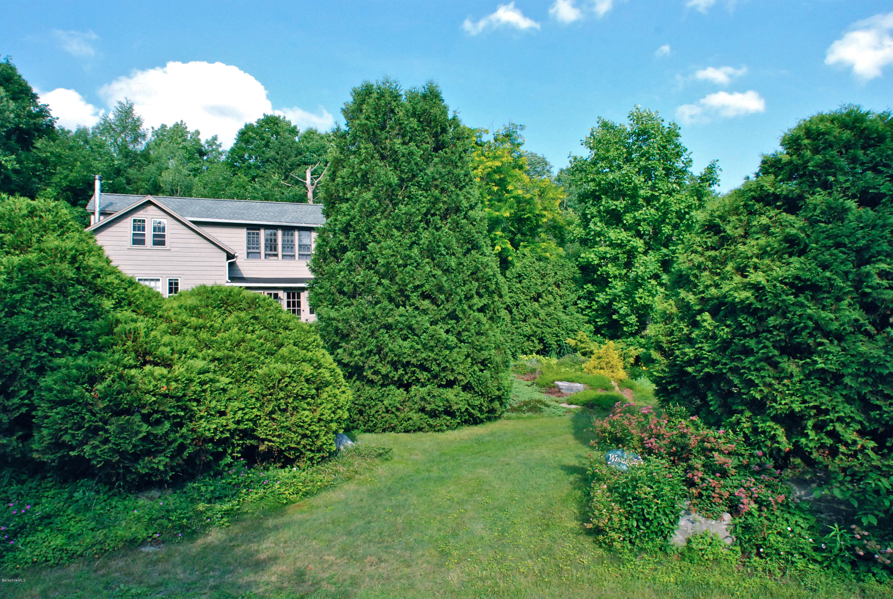 49 River Road Monterey, MA 01245 - Photo 2 of 43 a view of a house with a yard and a tree