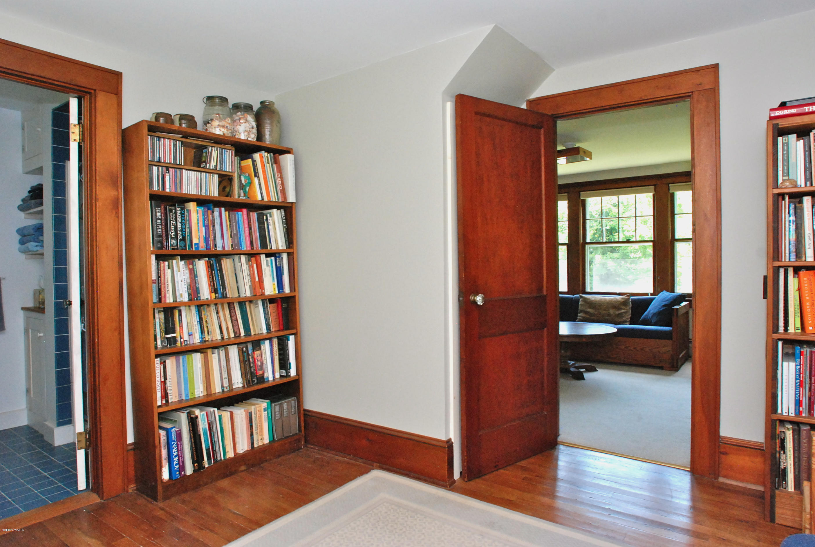 49 River Road Monterey, MA 01245 - Photo 19 of 43 a view of a livingroom with furniture and staircase