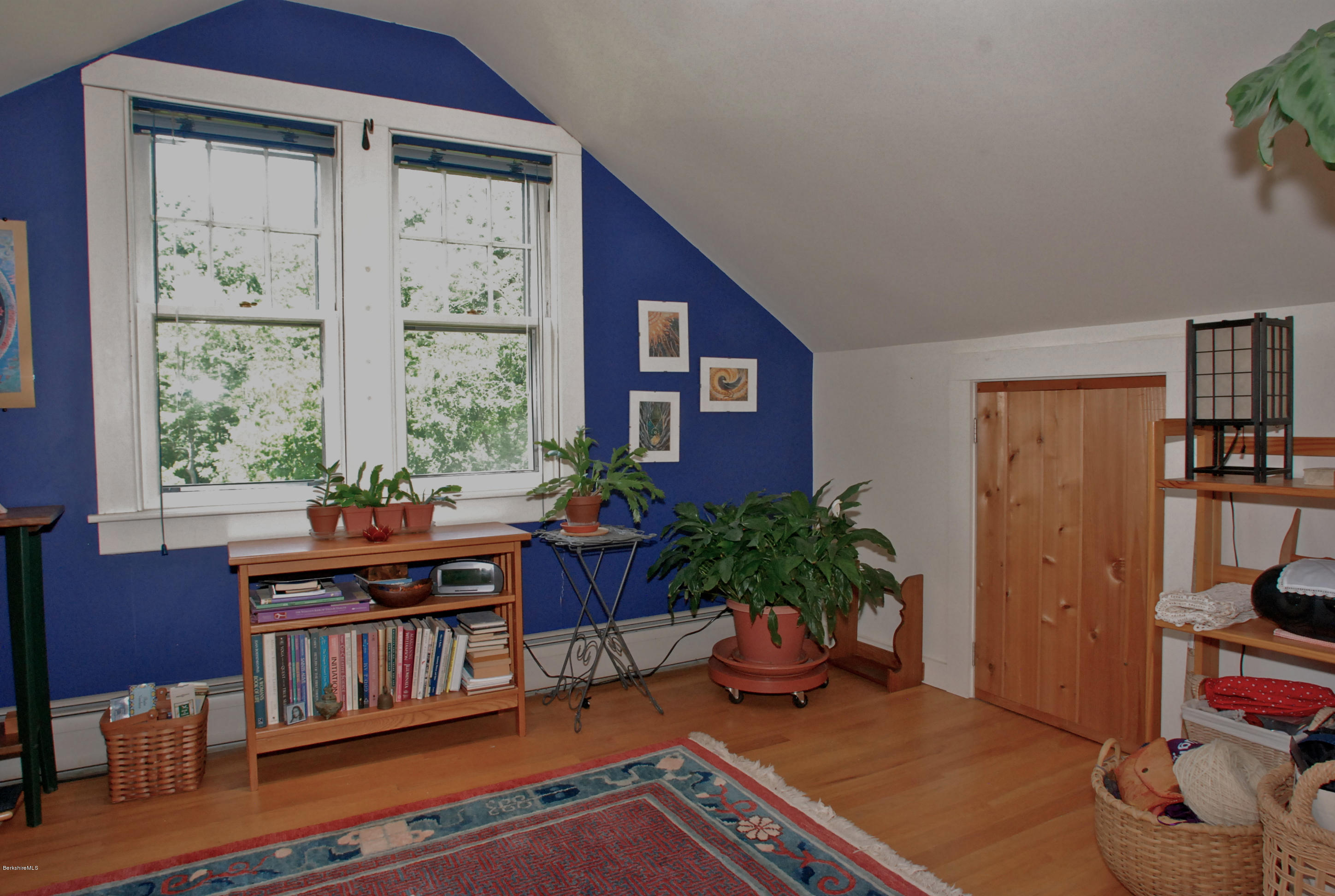 49 River Road Monterey, MA 01245 - Photo 23 of 43 a living room with furniture and a potted plant