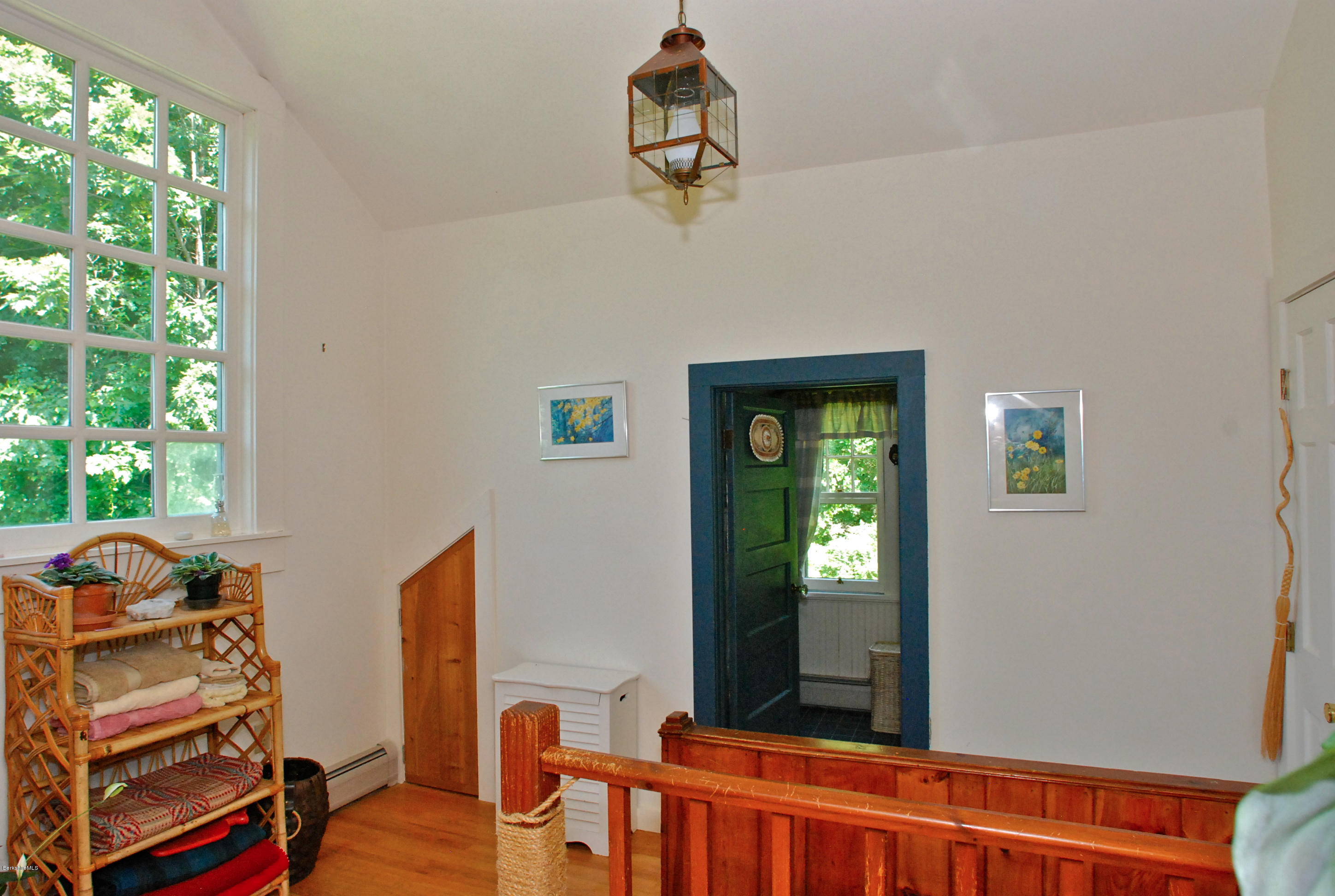 49 River Road Monterey, MA 01245 - Photo 24 of 43 a view of a hallway with windows
