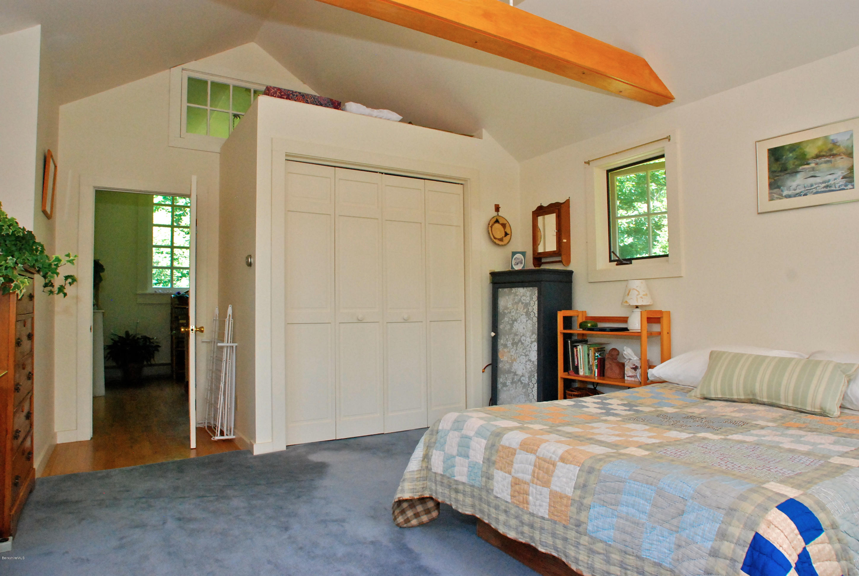 49 River Road Monterey, MA 01245 - Photo 28 of 43 a bedroom with a bed and a television