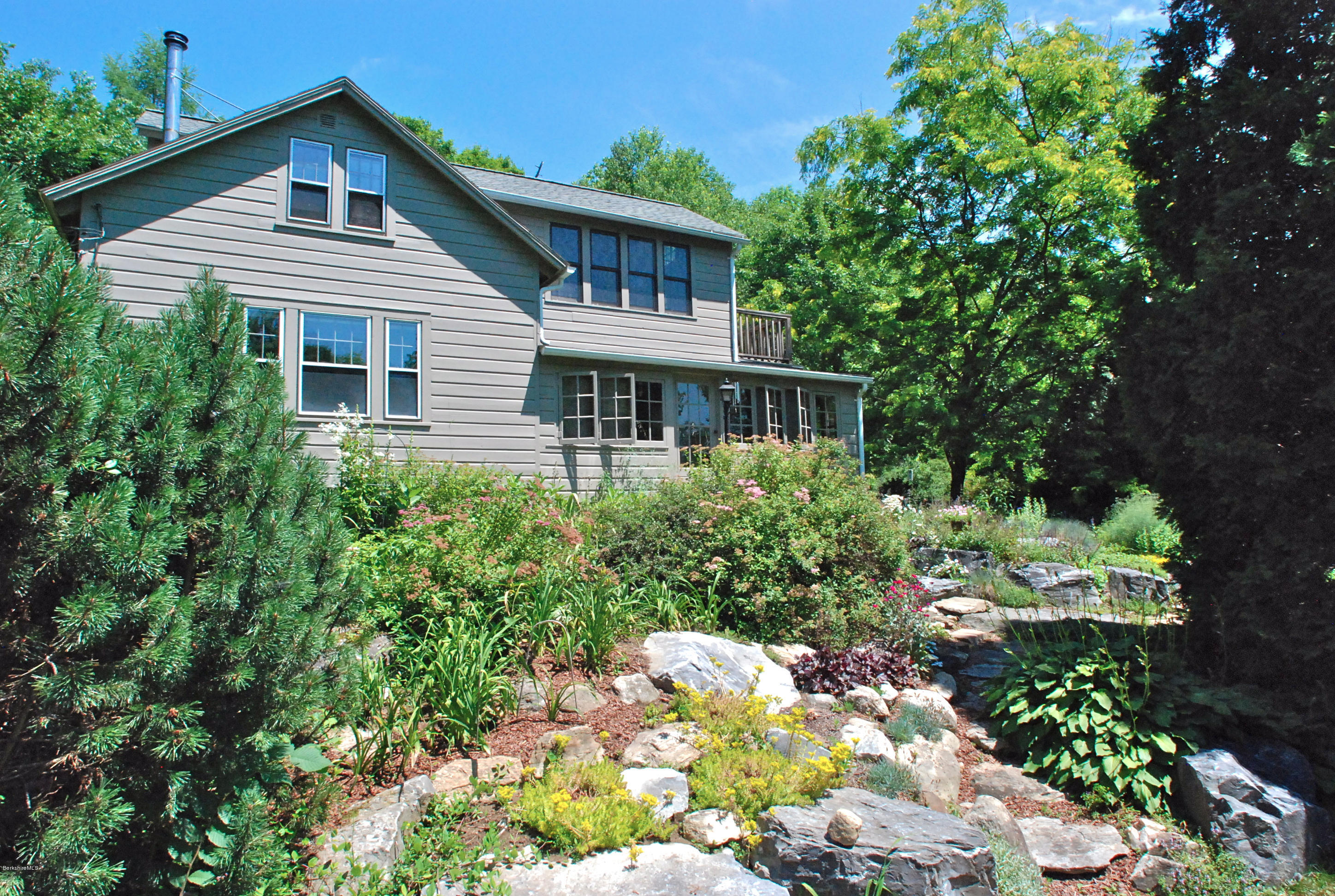 49 River Road Monterey, MA 01245 - Photo 30 of 43 a house view with a garden space