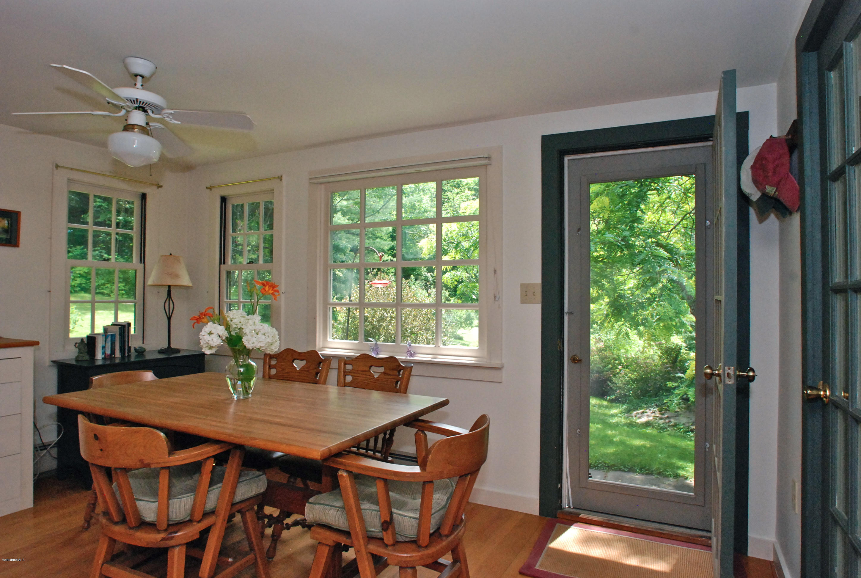 49 River Road Monterey, MA 01245 - Photo 7 of 43 a view of a dining room with furniture window and outside view