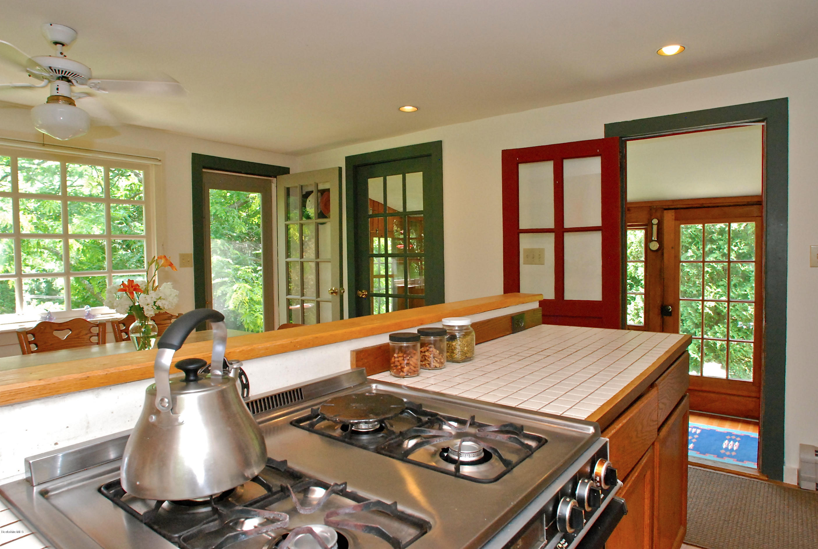 49 River Road Monterey, MA 01245 - Photo 10 of 43 a living room with furniture and large windows