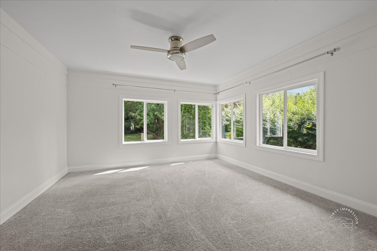 51 Burgess Road Geneva, IL 60134 - Photo 11 of 32 a view of an empty room with a window