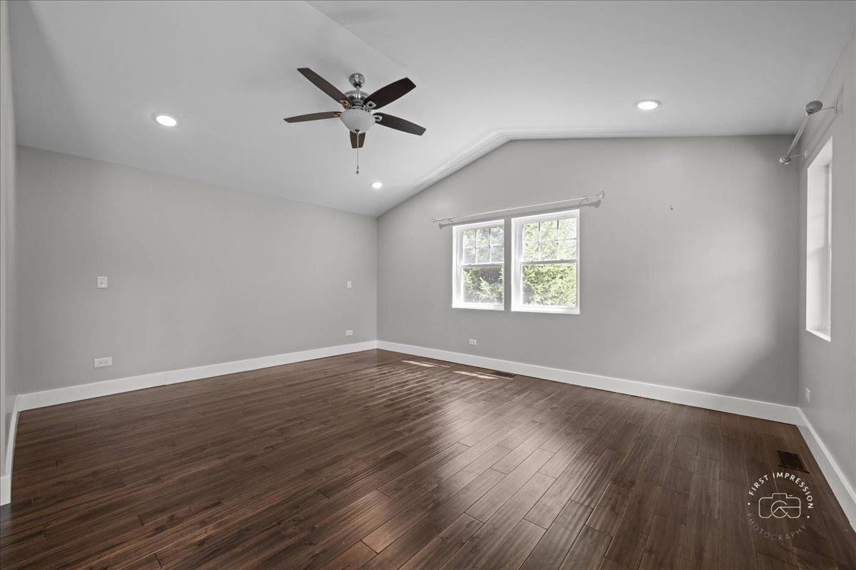 51 Burgess Road Geneva, IL 60134 - Photo 14 of 32 wooden floor in an empty room with a window