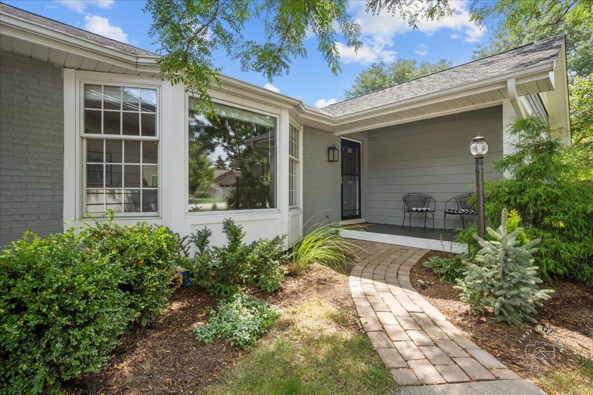 51 Burgess Road Geneva, IL 60134 - Photo 2 of 32 a front view of a house with garden