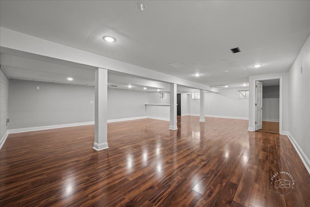 51 Burgess Road Geneva, IL 60134 - Photo 26 of 32 a view of a room with wooden floor