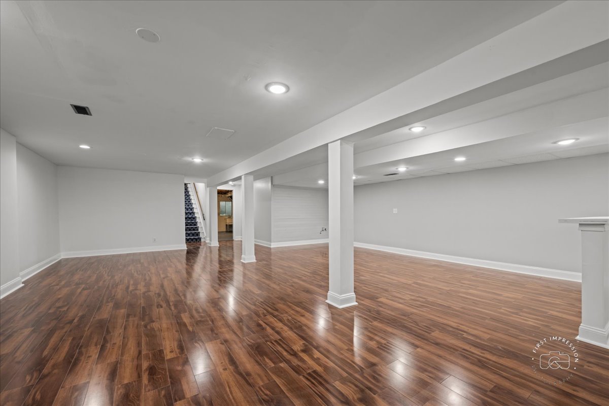 51 Burgess Road Geneva, IL 60134 - Photo 27 of 32 a view of empty room with wooden floor
