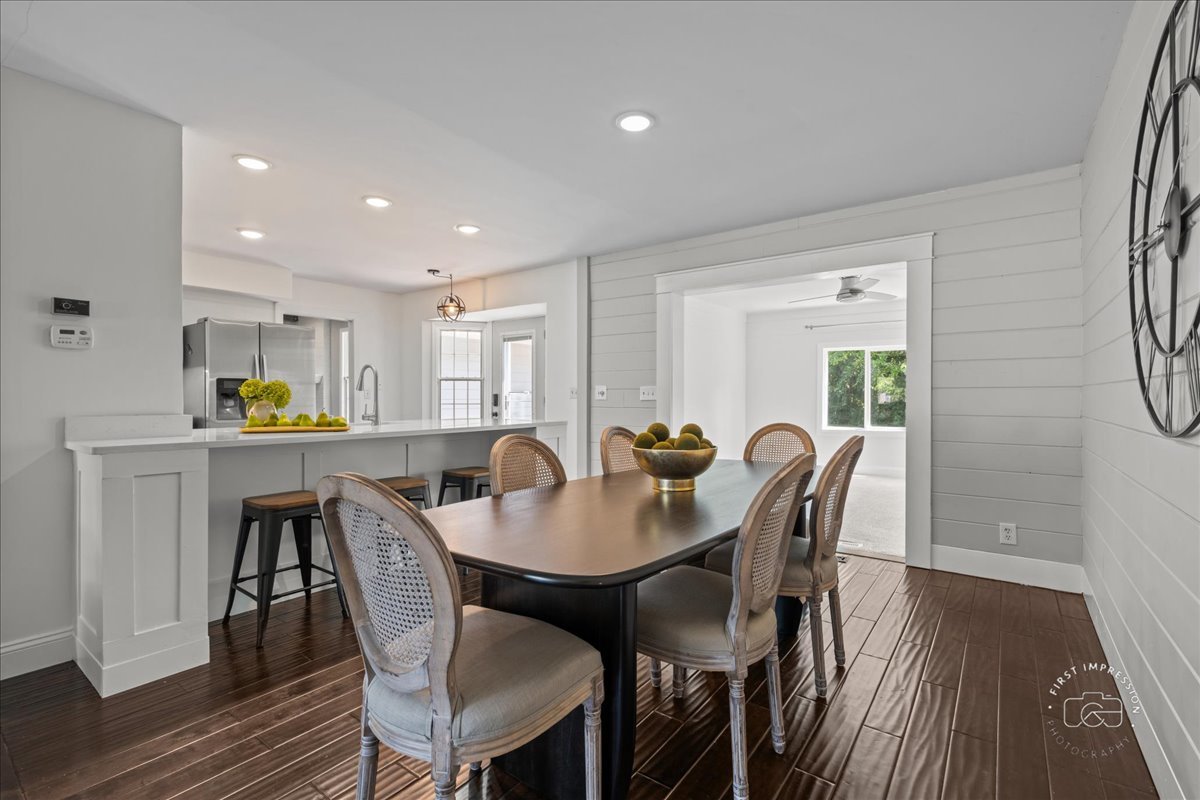 51 Burgess Road Geneva, IL 60134 - Photo 7 of 32 a view of a dining room with furniture and wooden floor