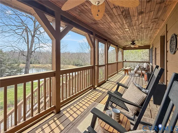 a view of a patio with wooden floor