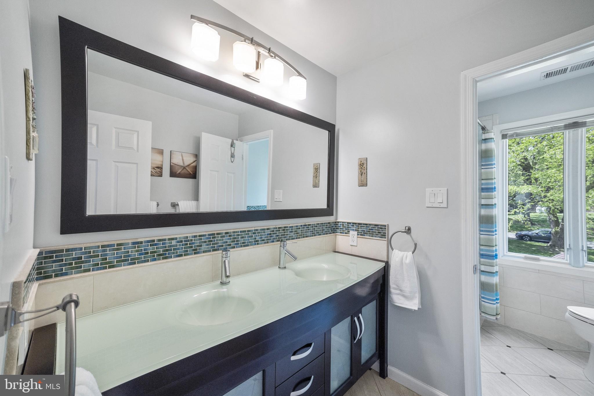 1703 Cold Spring Road Newtown Square, PA 19073 - Photo 24 of 38 Updated Hall Bath with separate tub/commode area